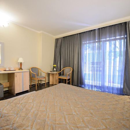 Holiday Olimp Hotel Rum bild
