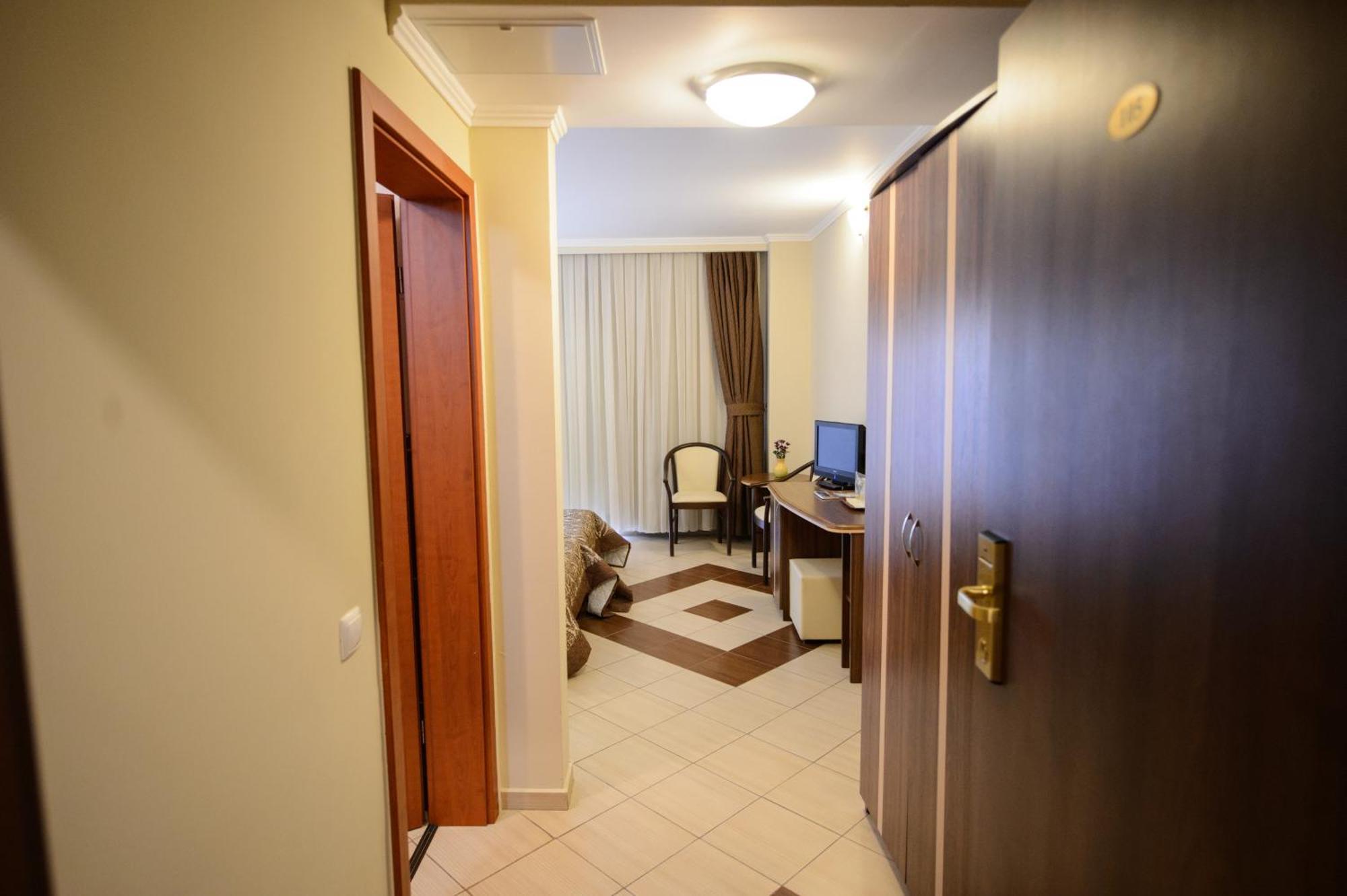 Holiday Olimp Hotel Rum bild
