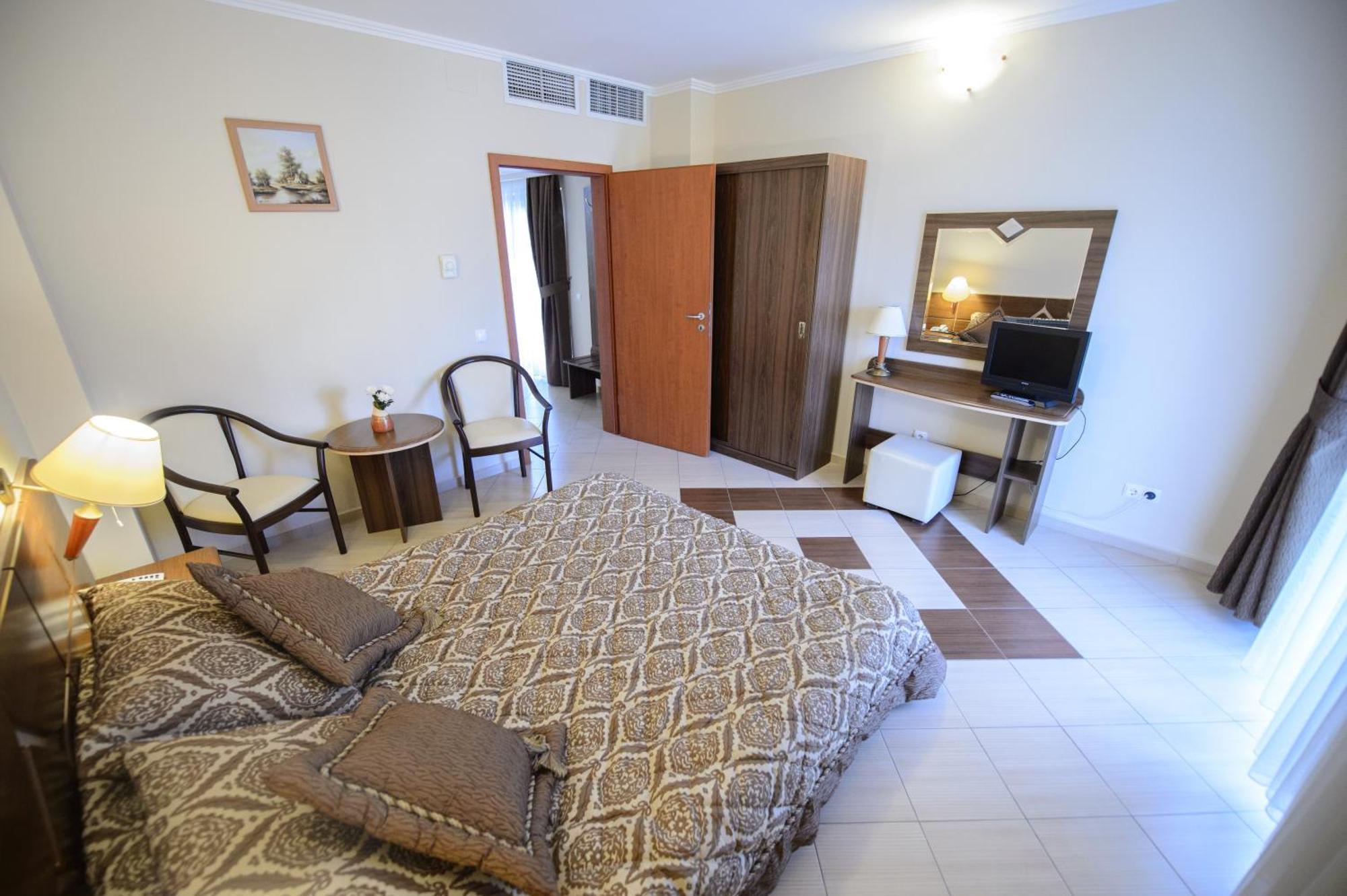 Holiday Olimp Hotel Rum bild