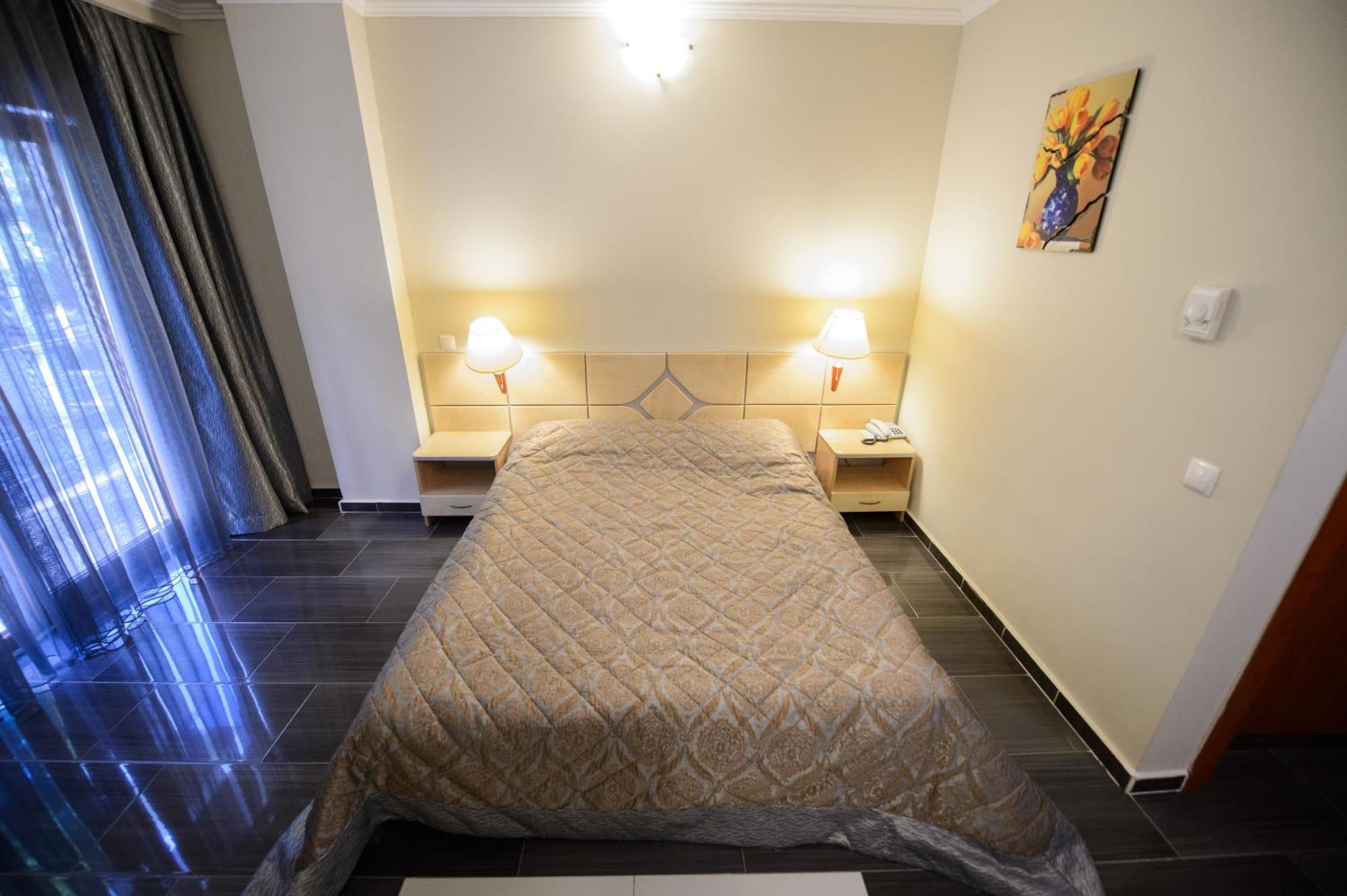 Holiday Olimp Hotel Rum bild