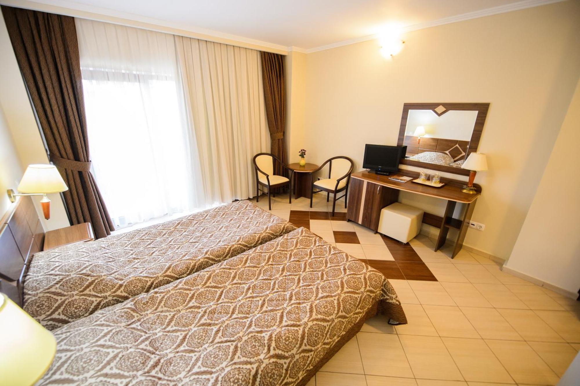 Holiday Olimp Hotel Rum bild