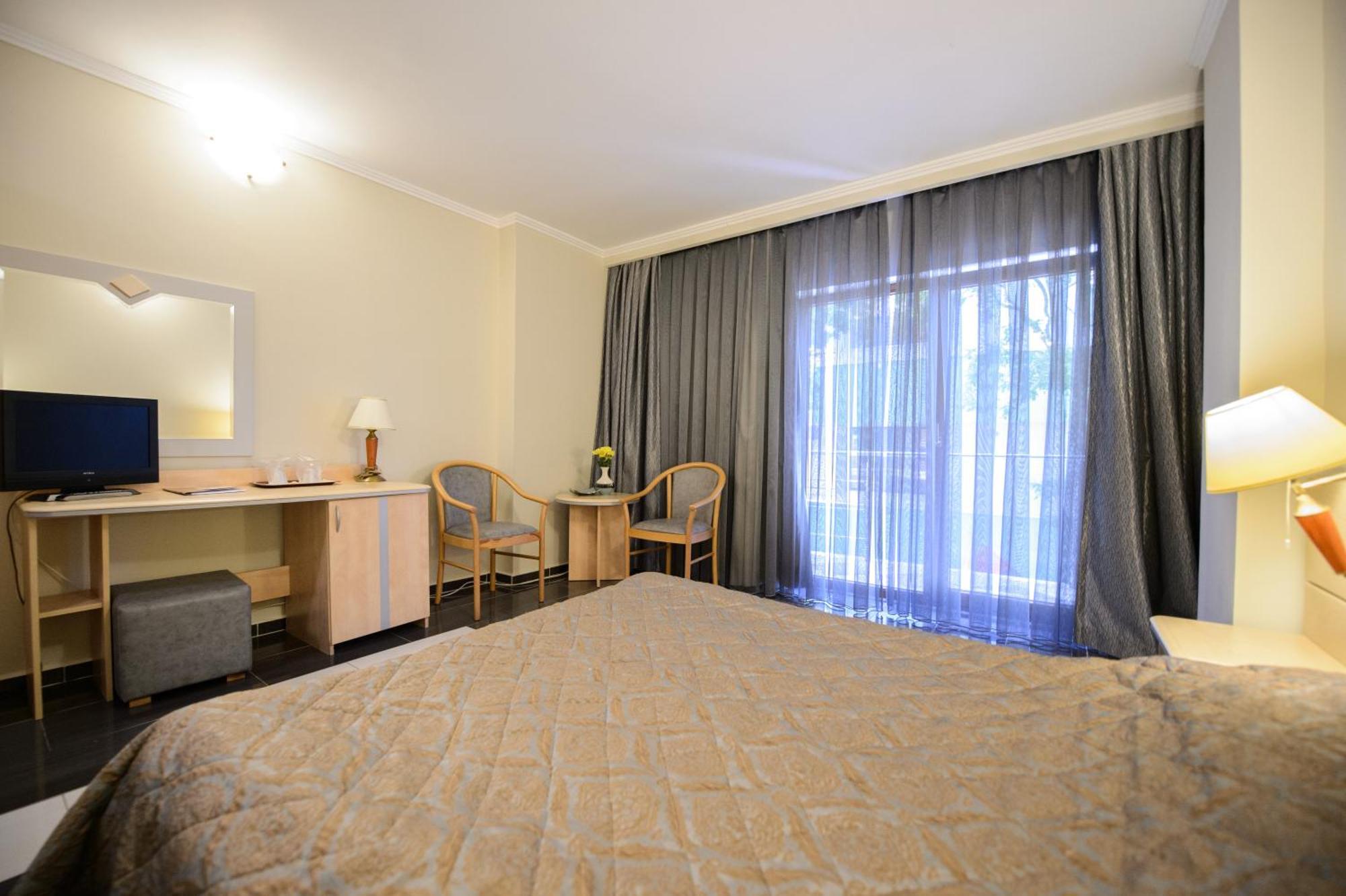 Holiday Olimp Hotel Rum bild