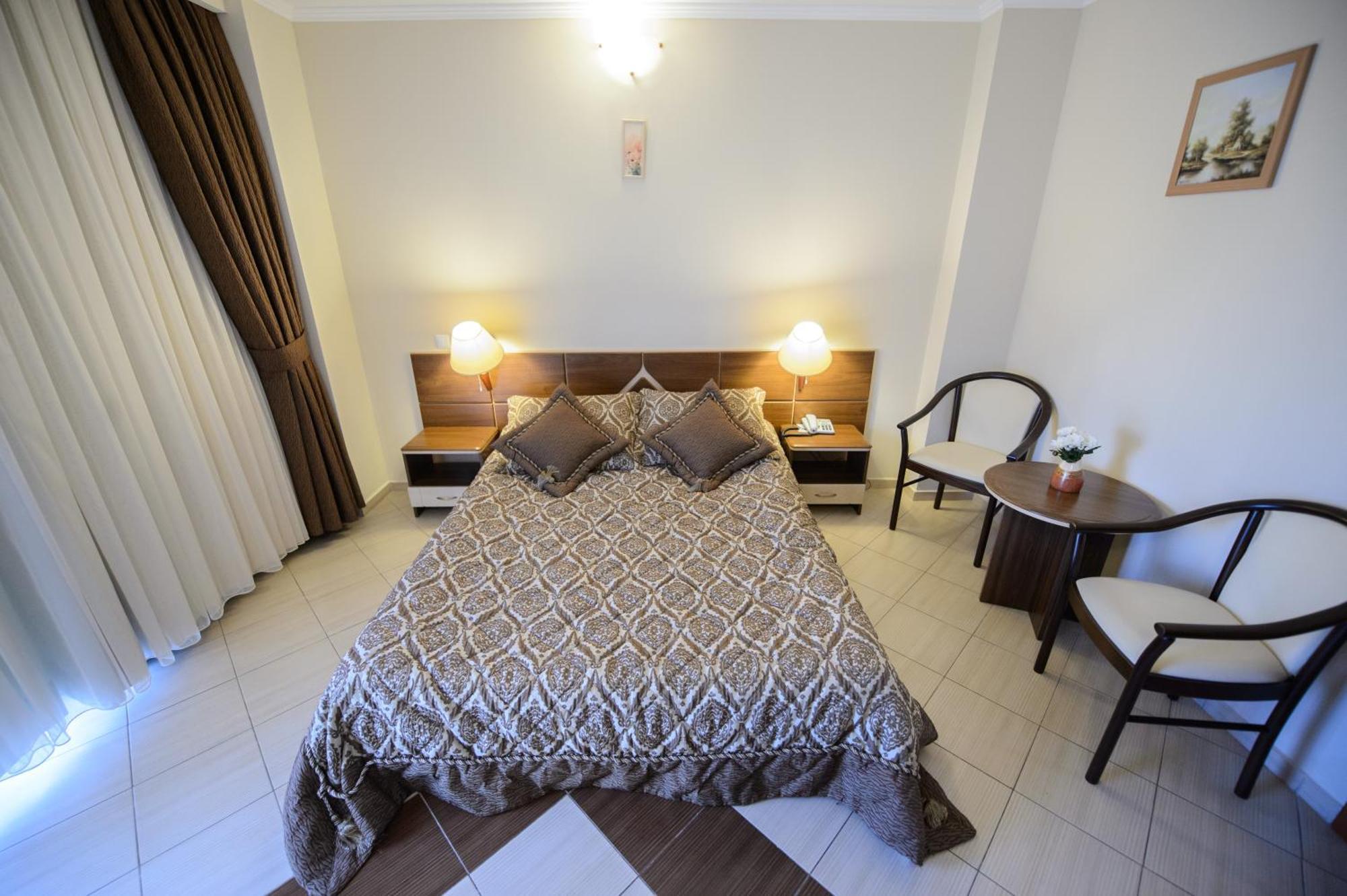 Holiday Olimp Hotel Rum bild