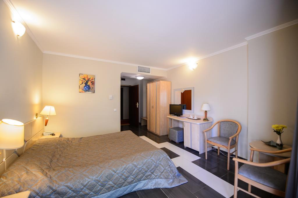 Holiday Olimp Hotel Rum bild