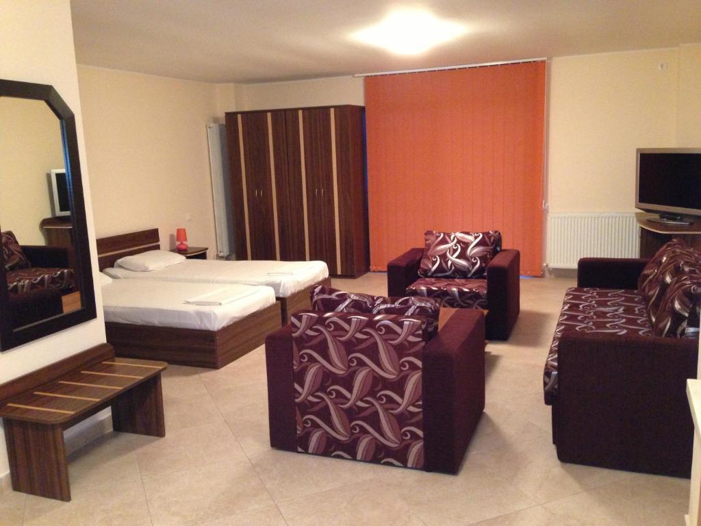 Holiday Olimp Hotel Rum bild